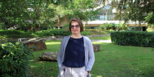 Grace standing on Campus 